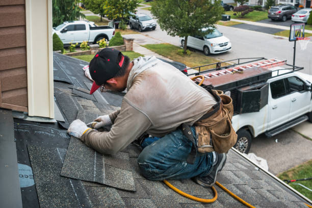 Professional Metal Roofing technician working in Wading River, NY